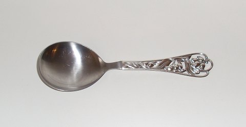 Serving spoon in silver and steel decorated with lily of the valley