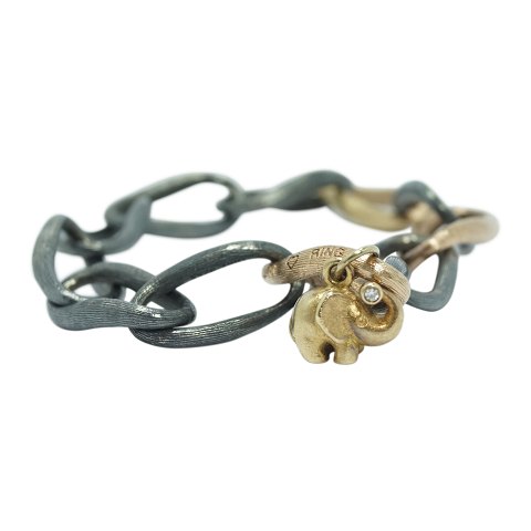 Ole Lynggaard, Charlotte Lynggaard; Love bracelet w. elephant/diamond pendant, 18k gold and sterling silver