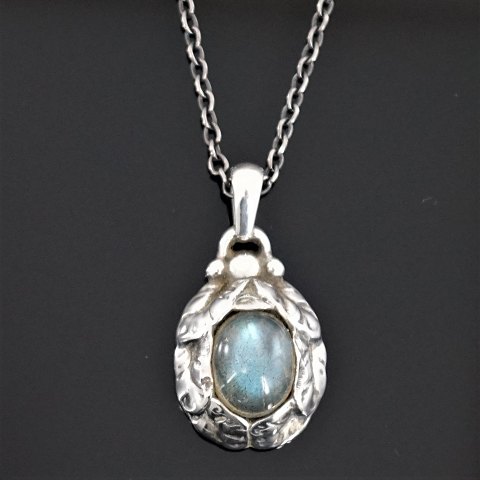 Georg Jensen; Heritage jewellery, 1997, made of sterling silver set with moonstone