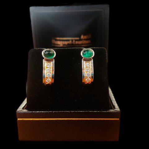 Frantz Hingelberg; Ear rings in 18k gold and white gold set with emerald and diamonds