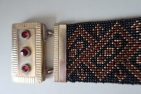 An antiques and beautiful bracelet, made of beadsMIght be made of silver, but no stampBeautiful and with 3 antiques "flusser" (=antiques beads) by the closingAbout 1870