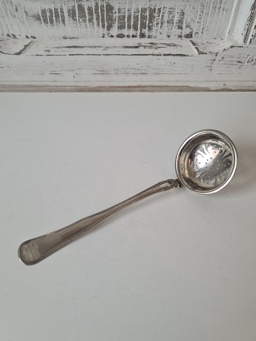 Antique Double fluted tea strainer in silver