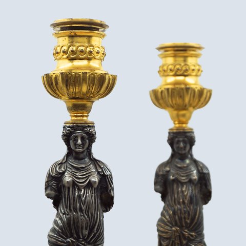 Ferdinand Barbedienne; Pair of French bronze candlesticks with gilded base and top