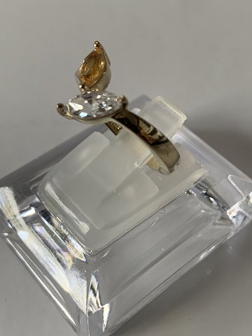 Elegant Damering i 8 karat Guld med gul og klar sten
Størrelse 52
