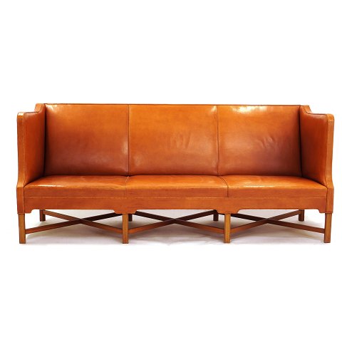 Kaare Klint three seater sofa 4118 with patinated 
natural leather. Very nice condition. L: 199cm. H: 
82cm. D: 80cm