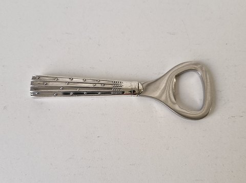 Champagne capsule opener in silver and steel