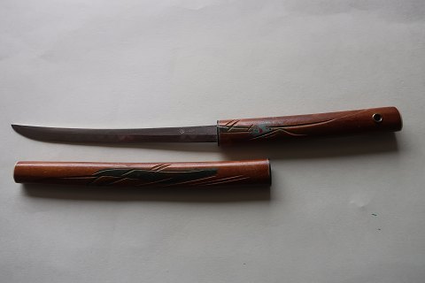 An old paper knife/paper cutter with a handle made of wood
The paper knife is good working with
L: 21cm
In a good condition