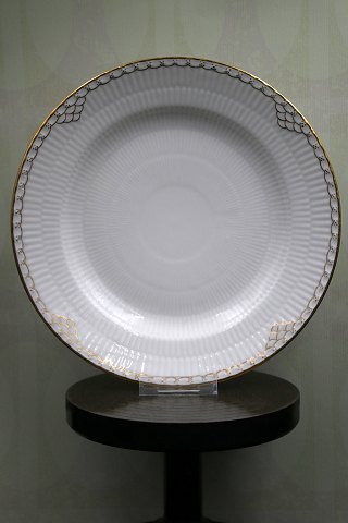 Rare Royal Copenhagen dinner plate in Princess with gold decorations. 
from 1850-70...