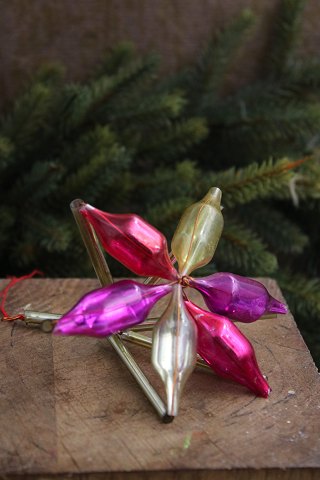 Old Christmas tree ornament in the form of stained glass ornaments from around 
1940...