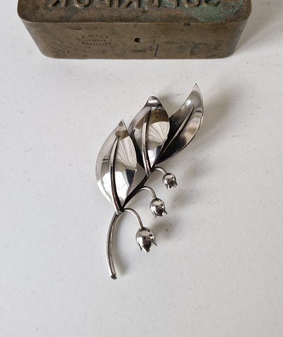 A. Michelsen silver brooch in the shape of a lily of the valley