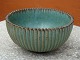 Arne Bang bowl No. 118 with knurled surface in greenish hue .Højde 7 cm diameter and 13 cm 5000 m2 showroom