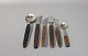 Cutlery set in Rosewood consisting of tablespoons, dinner- and lunch knifes and 
lunch forks, carving fork and demitasse spoon. 
5000m2 showroom.