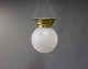Ceiling lamp in brass and frosted glass dome. the lamp has been refurbished.
5000m2 showroom.
