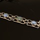 Silver bracelet with moonstones. Signed A.H.W. L: 19cm