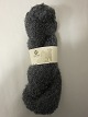 Mohair BoucléMohair Bouclé is a natural product of a very high quality from the angora goat from South Africa.The colour shown is: Steel grey, Colourno 10351 ball of wool containing 100 grams