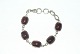 Elegant silver bracelet with red stones