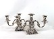 A set of two armed candlesticks of hallmarked silver.
5000m2 showroom.
