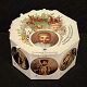 Royal Copenhagen; "Peters Jul" 8 Christmas cake plates of porcelain, original box