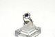 Lady ring with dark blue stones in 14 carat gold
Size 58