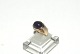 Lady ring with purple stone in 8 carat gold
Size 52