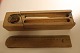 An old pencil box with decorations cut in the wood 
and flowerdecoration as well
This is an exampel of how the pencil box was in 
the good old days