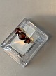 Ladies Ring with Red Stones in 14 Carat Gold
Size 55
