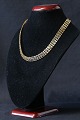 Gold necklace in 14 carat gold with V pattern and box ...