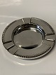 Bottle tray in silver, with a nice and elegant pattern. Stamped D.A 830s
