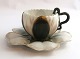 Bing & Gröndahl. Small cup. Handle in the shape of a snake. Diameter of saucer 
11.5 cm. Height of cup 4.5 cm. Saucer has a defect. See photo.