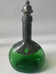 Green carafe with tin.Danish design.Height.: 25 cm.