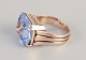 Bernhard Hertz, Danish goldsmith.14 karat gold ring adorned with light blue semi-precious stones.