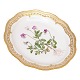 Flora Danica ovalt serveringsfad med gennembrudt fane. "Viola tricolor". Royal 
Copenhagen år 1950. Mål: 27x22cm