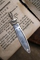 Old bookmark in silver (stamped) Length 8.5cm. with bird motif and text 
"Texel"...