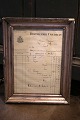 Old French handwritten liquor bill framed in an old silver frame with patina...