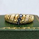 Ring in 14k gold set with sapphires and diamonds