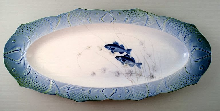 Arnold Krog for Royal Copenhagen: "Fish service" porcelainvery large oval fish dish decorated in colors with fish.