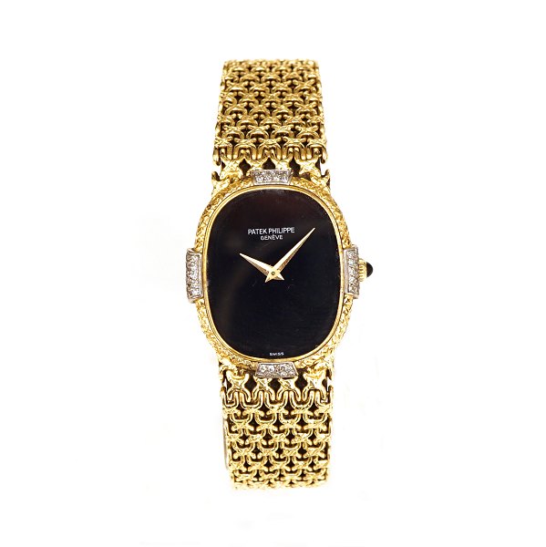 Patek Phillipe Golden Ellipse 18ct Gold with diamonds. Black onyx dial. Ref. 
4307. Size dial: 2,5x2,1cm. Bracelet L: 18,5cm