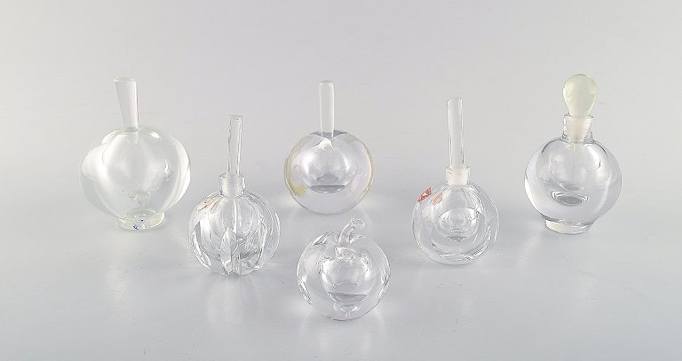 Edward Hald for Orrefors. A collection of six mouth blown flacons in clear art glass. Designed in the 1940