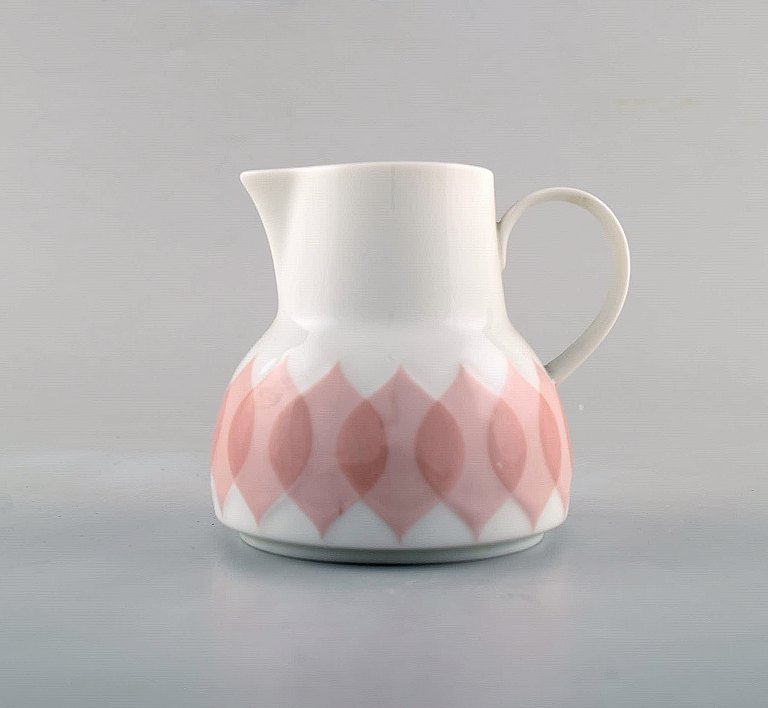 Bjørn Wiinblad for Rosenthal. "Lotus" porcelain service. Creamer decorated with pink lotus leaves. 1980