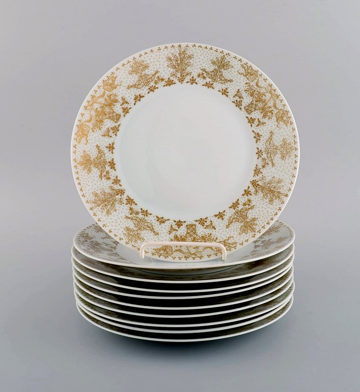 Bjørn Wiinblad for Rosenthal. 10 tallerkener i porcelæn med gulddekoration. 
1980