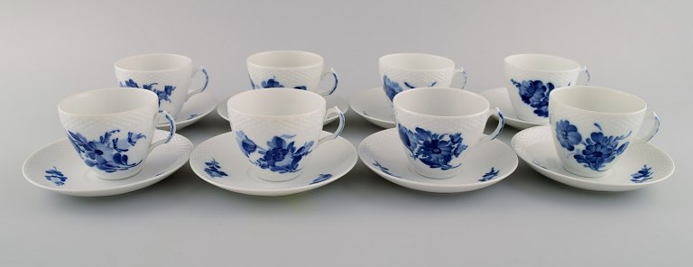 Eight Royal Copenhagen Blue Flower Braided coffee cups with saucers. Mid 20th century. Model number 10/8261.