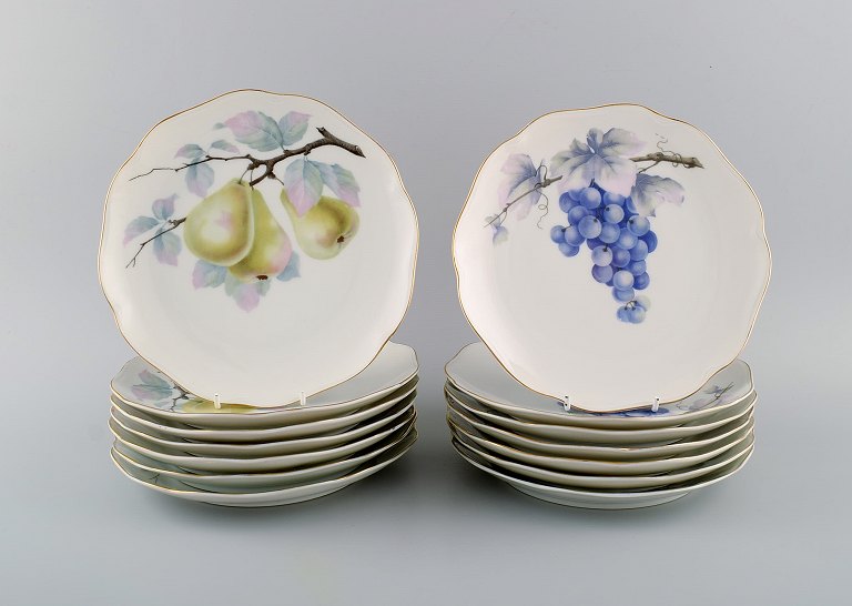 Kronach, Germany. 14 porcelain plates with hand-painted fruits. 1940s.