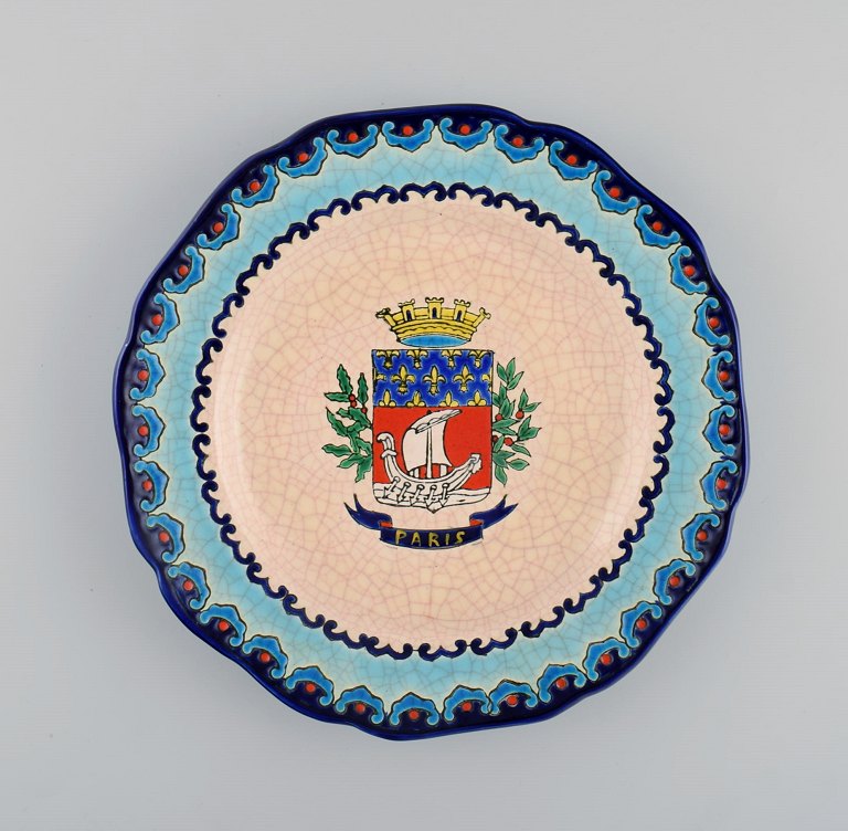 Longwy, France. Art deco plate in glazed stoneware with hand-painted Parisian coat of arms and foliage. 1920s / 30s.
