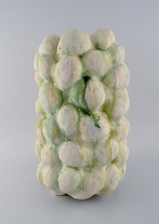 Christina Muff, Danish contemporary ceramicist (b. 1971). Large sculptural unique vase in glazed stoneware. Beautiful cream glaze with minerals from Danish beaches.