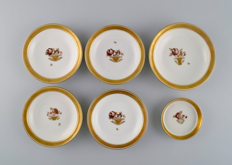 Six Royal Copenhagen Golden Basket porcelain bowls with flowers and gold decoration. 1960s.