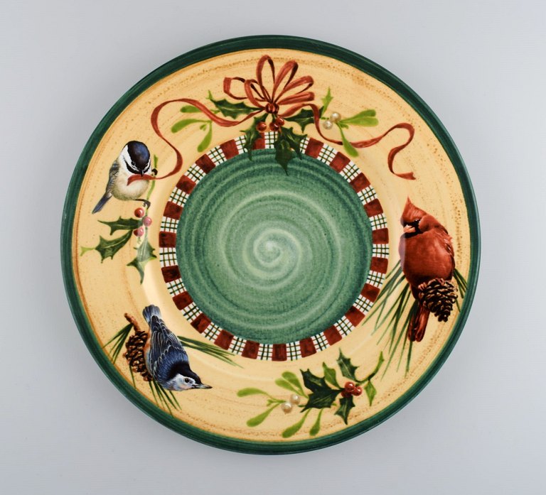 Catherine McClung for Lenox. "Winter greetings". Large round dish in glazed stoneware decorated with mistletoe, birds and red ribbon. Approx. 2000.