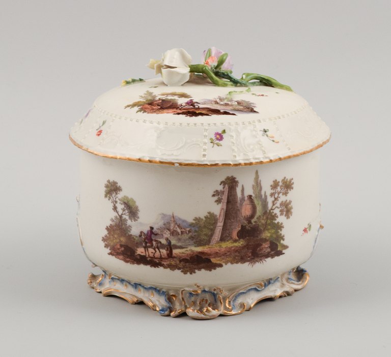 Louisbourg, Germany. 18th century large sugar bowl, hand painted with landscape scenes, lid with flowers in relief.