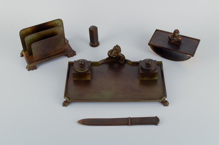 GAB Sweden, a writing set in bronze consisting of an inkwell, letter knife, letter holder, seal and inkwell.