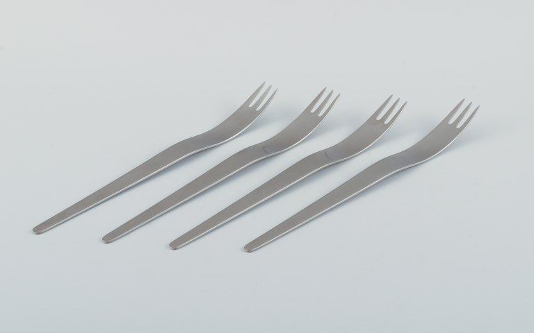 Arne Jacobsen for Georg Jensen. Modernist AJ cutlery.Four long salad forks in stainless steel.