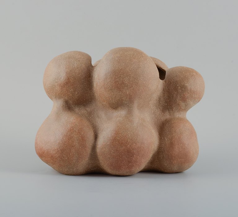 Christina Muff, Danish contemporary ceramicist (b. 1971). Golden brown unglazed stoneware vessel. Unique, hand modelled organic shape. Clear glaze inside.